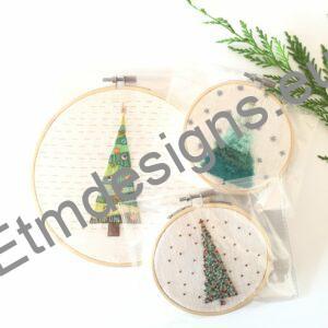 3 Christmas hoops, hand embroidery on white fabric