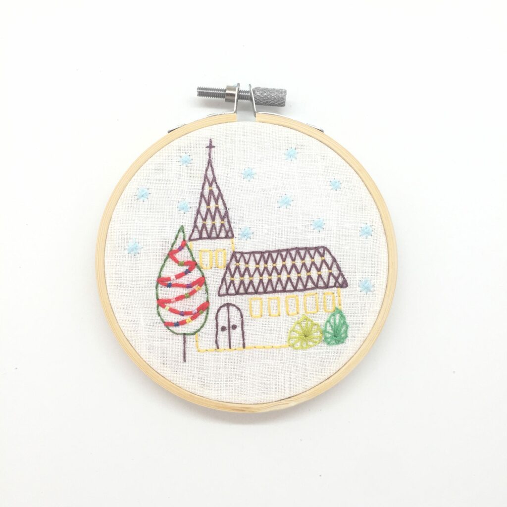 Hand embroidery picture Church with Christmas tree