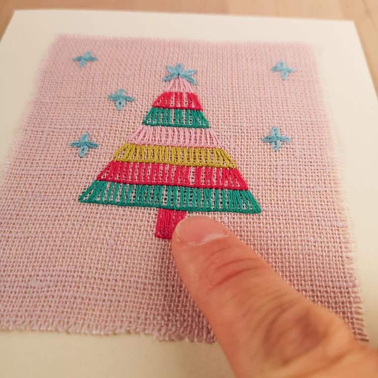 Attaching the embroidery on the card