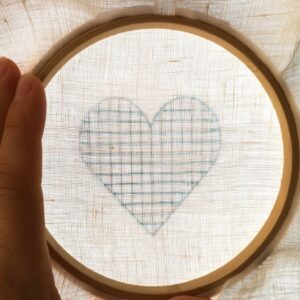 Transferring a heart shape on a sunny window