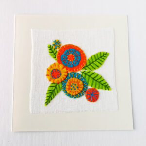 Embroidered postcard with colorful floral applique