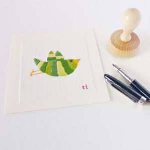 Greeting card with bird embroidery