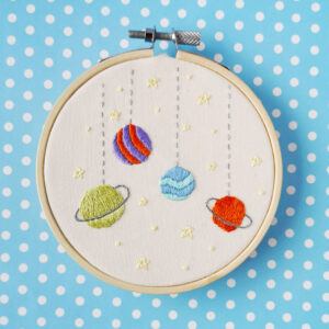 Hand embroidery with planets
