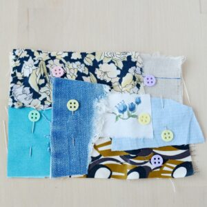 Assemble fabric scraps for zipper pouch