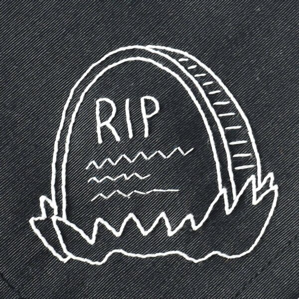 Hand embroidered Halloween design with a tombstone RIP