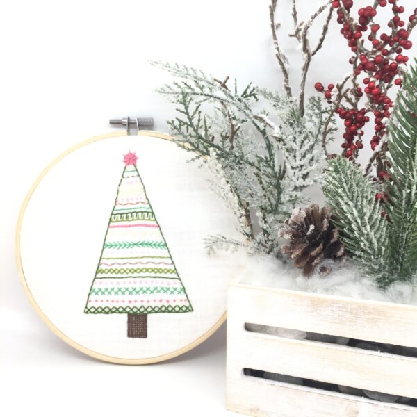 Christmas tree with a star embroidered hoop wall hanging
